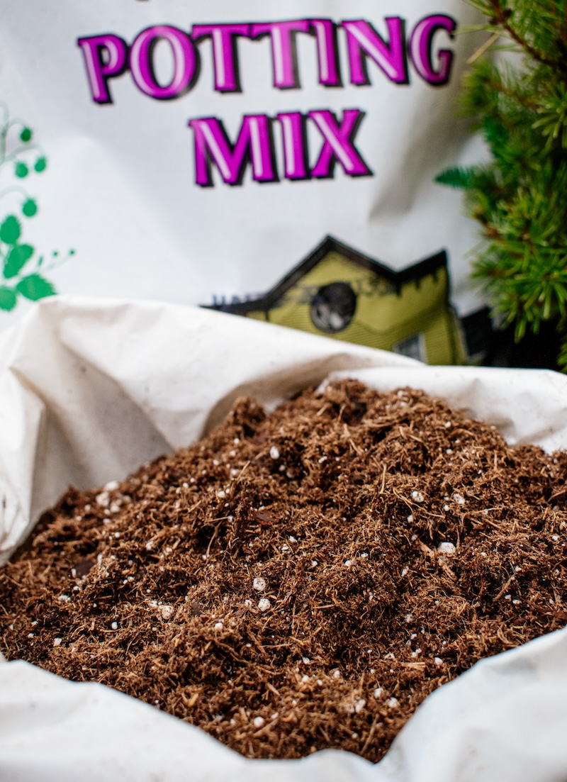 open bag of loamy Gethsemane-brand potting soil